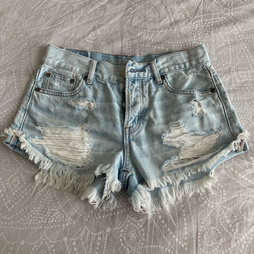 Distressed denim shorts